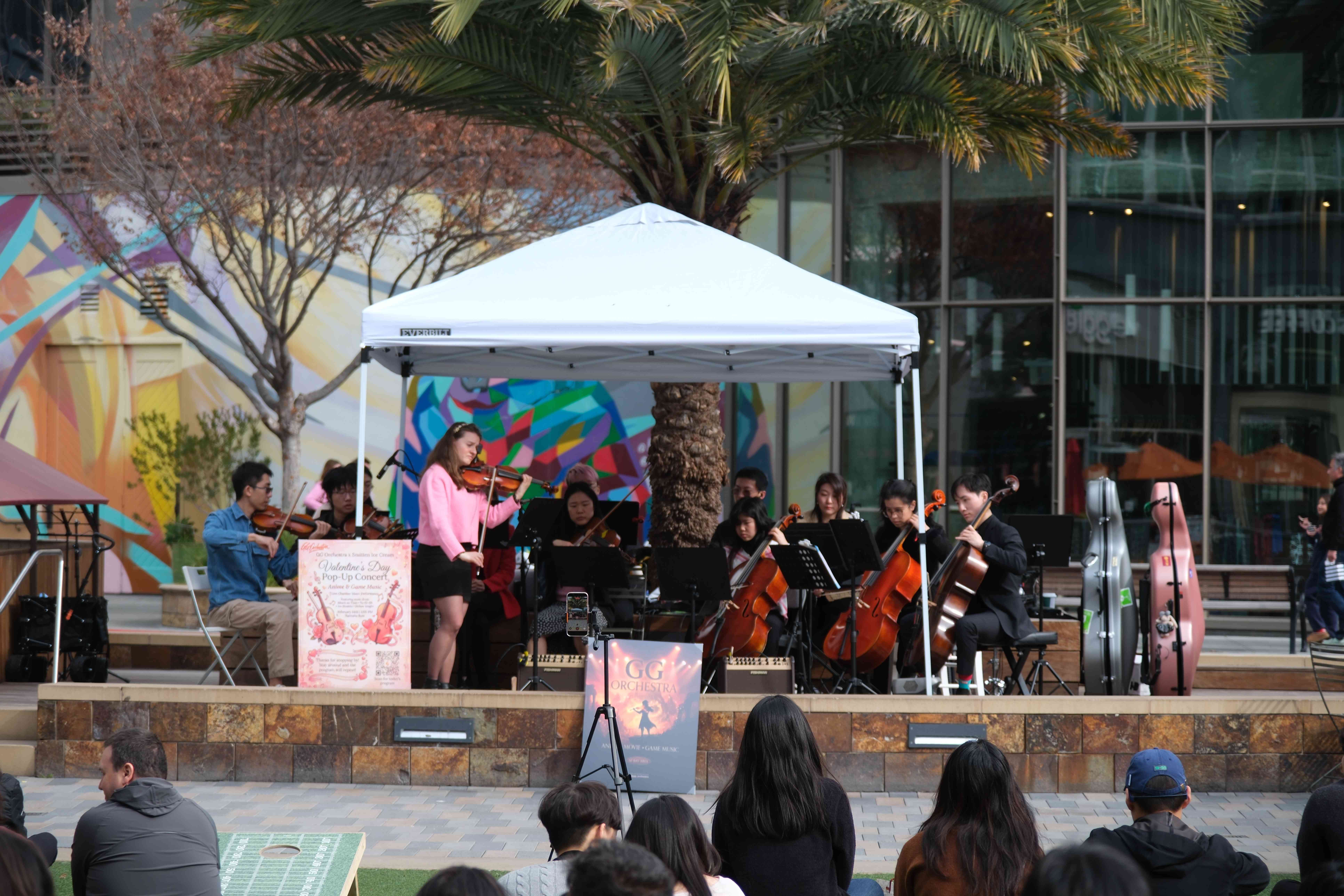 The GG Orchestra performing at an outdoor community pop-up concert