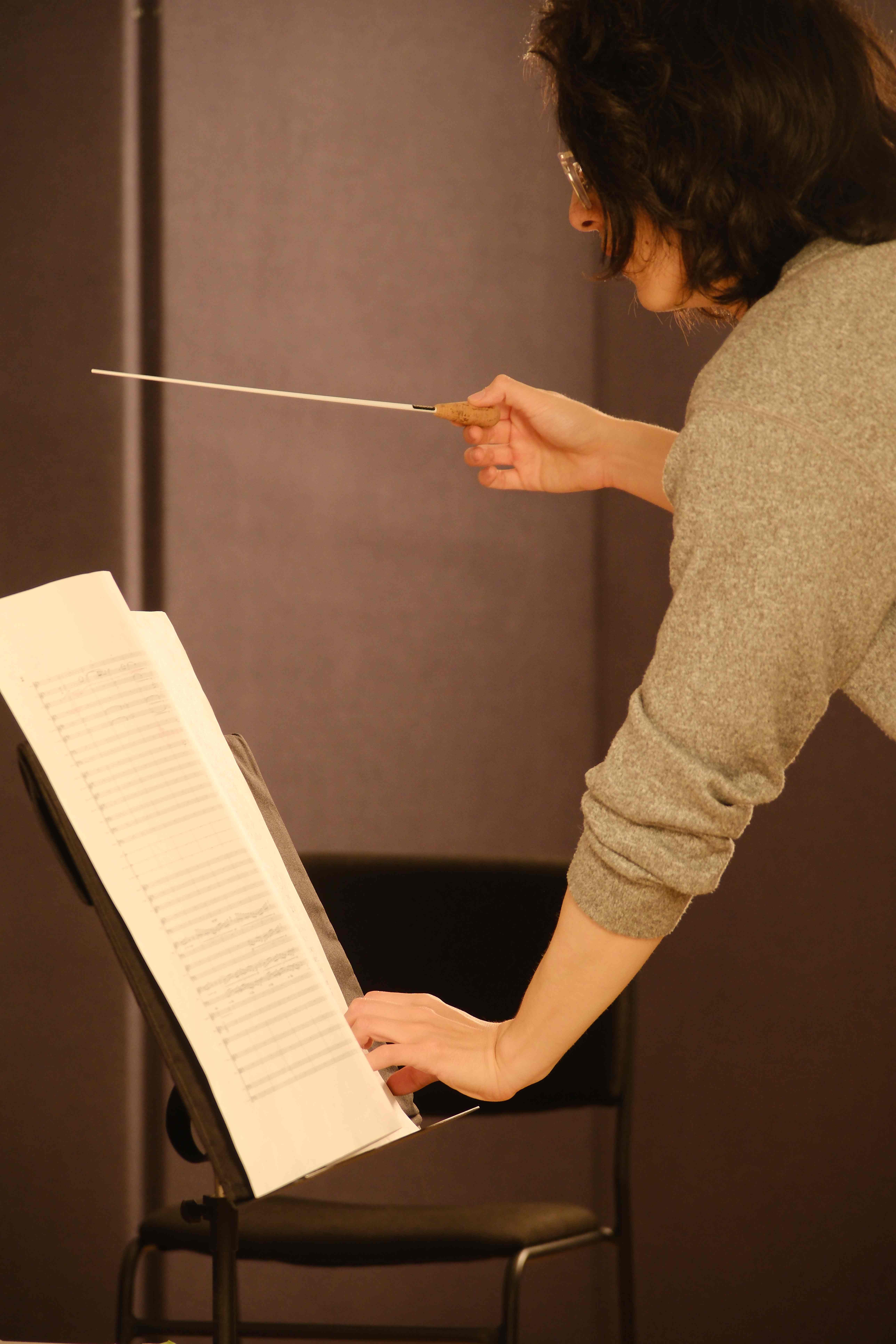 Musicians reviewing score